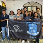 BGCofSLC YOY Guatemala group holding banner