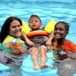 BGCofSLC YOY Guatemala with kid in pool